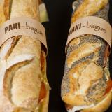 Baguette und Körner-Sandwich mit personalisierten Holzringen